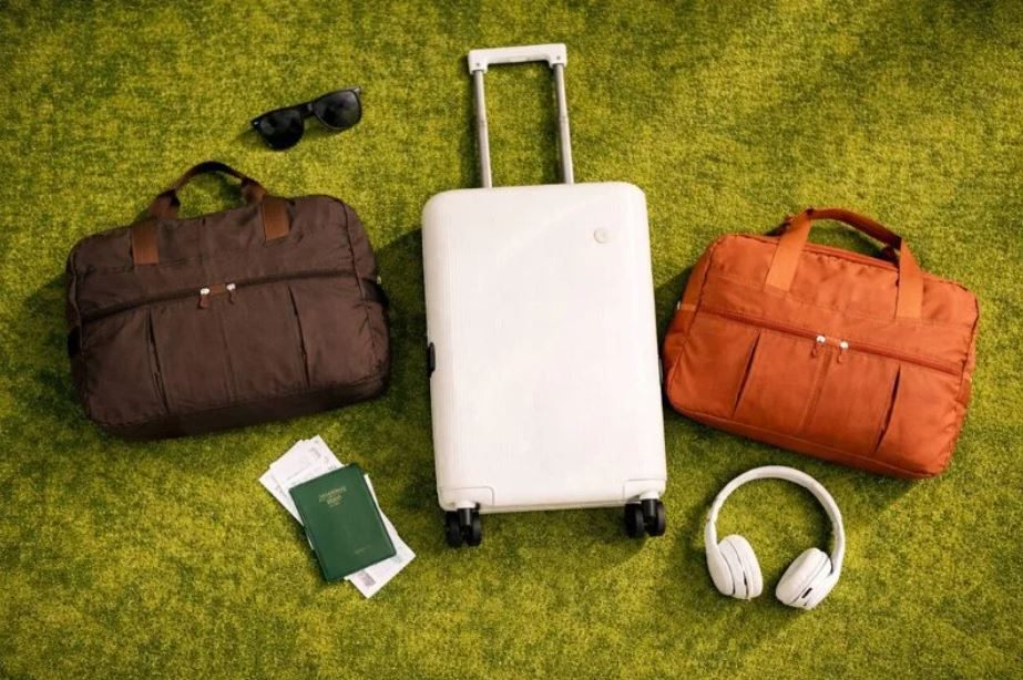 50萬股東看這裡！台泥與中鋼紀念贈品並列股民新寵　「美拉德風」旅行袋亮相：領取資格、時程一次看